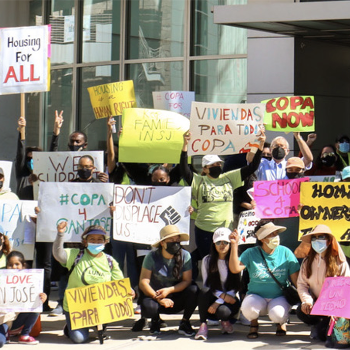 people holding signs